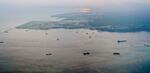 　政府が工事に着手した、沖縄県名護市辺野古沖の大浦湾。湾内では軟弱地盤が見つかっている＝１０日午後５時２３分（共同通信社機から）