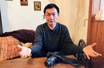 戦況や首都キーウの市民生活などについて語る平野さん＝１４日、米子市内