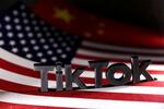 　ＴｉｋＴｏｋのロゴと米中の国旗＝４月（ロイター＝共同）