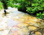 久須部川の滑床。凝灰岩でつくられ、天然のウオータースライダーとなっている
