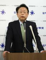 　記者会見する公明党の西田幹事長＝１２日午後、国会