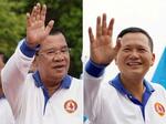 　カンボジアのフン・セン首相（左）と、長男のフン・マネット氏（ロイター＝共同）