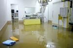　２０１９年１０月１３日、台風１９号で阿武隈川の支流があふれ、床上浸水した星総合病院の放射線撮影室＝福島県郡山市（同病院提供）