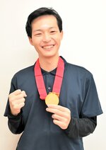 ソーシャルフットボールのフットサルで初のアジア大会に日本代表として出場し、優勝した浦田さん＝鳥取市湖山町西１丁目のうぶみ苑多機能型事業所