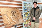 ＹＡＳＵさん（右）が描いたフィリピンの子どもたちをテーマにした作品＝１８日、鳥取市役所