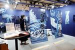 　藍染め作品を手がける徳島市の「青藍工房」のブース＝２日、パリ（共同）