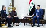 　イラク・バグダッドでスダニ首相（右）と会談するブリンケン米国務長官（左）＝５日（イラク首相府提供、ゲッティ＝共同）