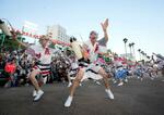 　「阿波おどり」が開幕し、踊りを披露する人たち＝１２日午後、徳島市