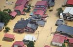 　大雨の影響で浸水した山形県戸沢村の住宅＝２６日午前１０時３６分（共同通信社機から）