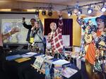 　「北海道ゲームアーカイブ協会」主催のイベントに登場した、元ハドソン社員の「高橋名人」（右から２人目）＝２０２３年１２月、札幌市内（同協会提供）