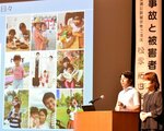 交通事故撲滅と被害者支援の拡充を訴える松永さん＝３日、鳥取市のとりぎん文化会館