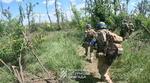 　ウクライナ東部ドネツク州バフムト近くの前線のウクライナ兵。２６日に公開された動画から（ウクライナ軍提供、ロイター＝共同）