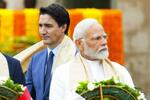 　２０カ国・地域首脳会議の関連行事に出席したインドのモディ首相（手前）とカナダのトルドー首相＝９月、ニューデリー（ＳＥＡＮ・ＫＩＬＰＡＴＲＩＣＫ、カナダ通信提供・ＡＰ＝共同）
