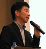 業界のやりがいや仕事内容について話す田中チーム長