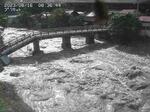 　台風７号の影響で一部が崩落した鳥取市の佐治川に架かる高山橋＝１６日午前（鳥取県河川課提供）