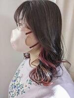 　抗がん剤治療前、ロングヘアだった黒岩雅さん＝２０２２年１１月（本人提供）