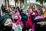 　マレーシアの首都クアラルンプールで行われたイスラエルに対する抗議デモ＝１３日（共同）